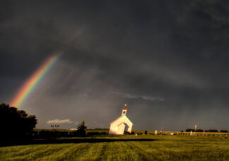 Angry Sky, Rainbow, and a Crooked Church