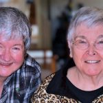 A photo of Rev. Gail Ricciuti and Dr. Virginia Ramey Mollenkott at Virginia's 80th birthday celebration.